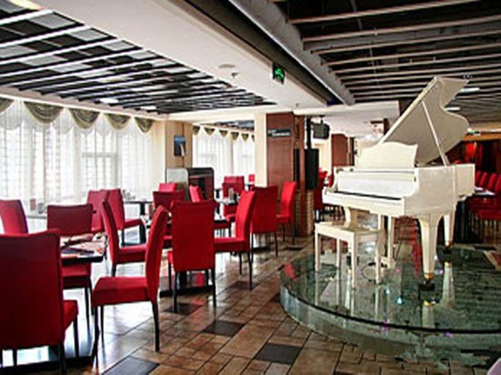 Tangyin Hotel Dalian Bagian luar foto