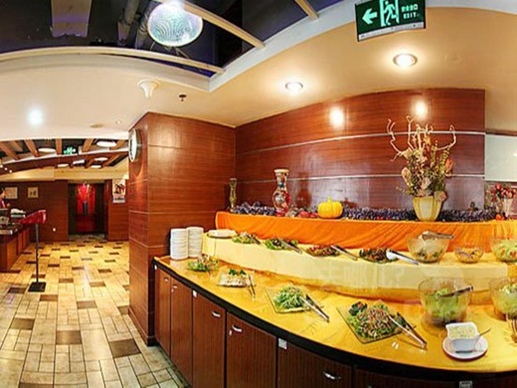 Tangyin Hotel Dalian Bagian luar foto