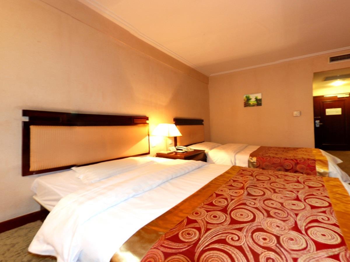 Tangyin Hotel Dalian Bagian luar foto
