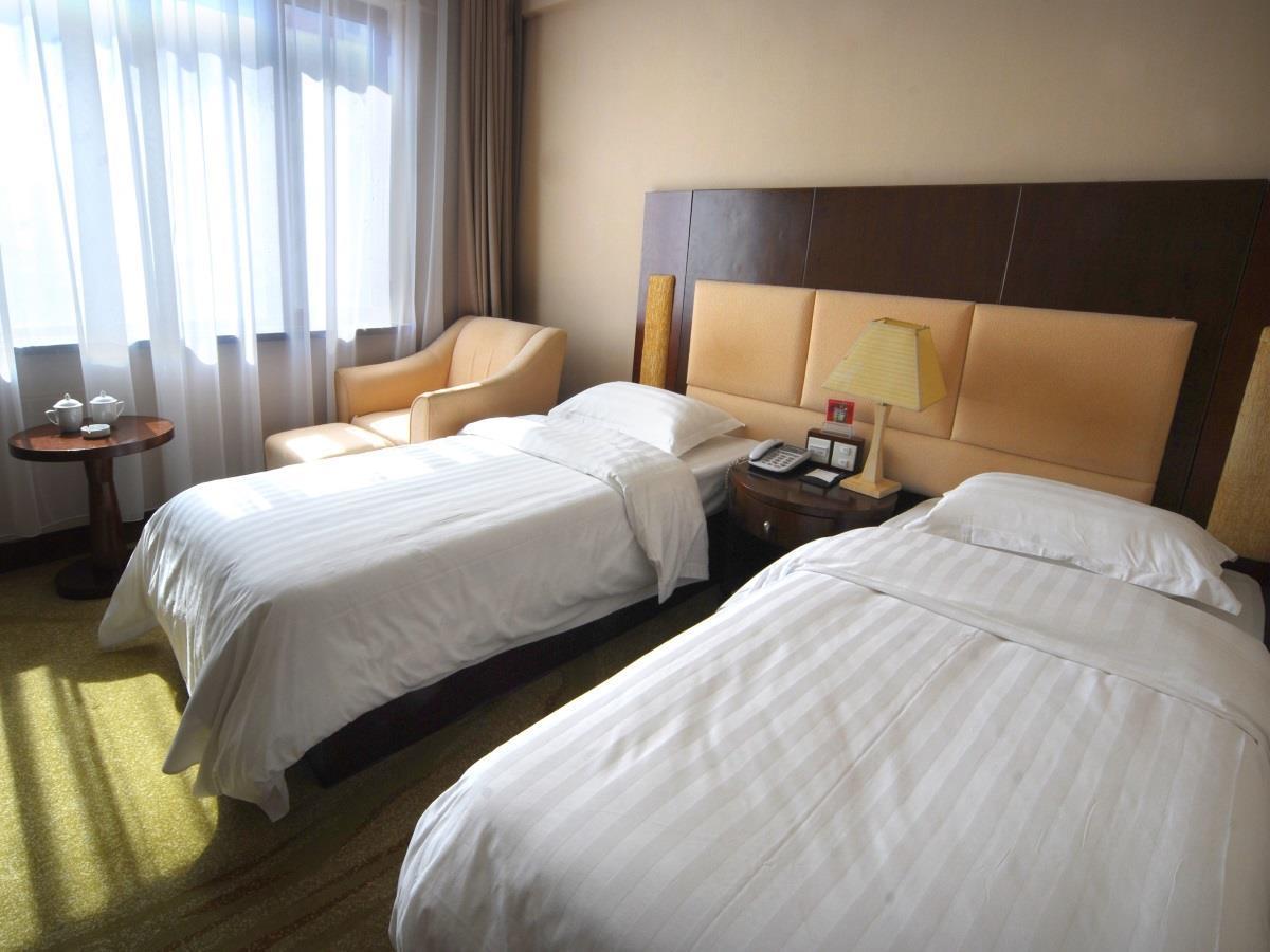Tangyin Hotel Dalian Bagian luar foto
