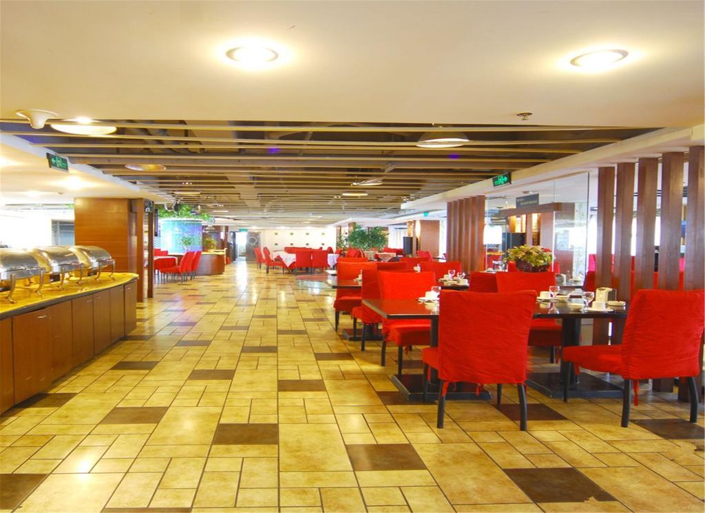 Tangyin Hotel Dalian Bagian luar foto
