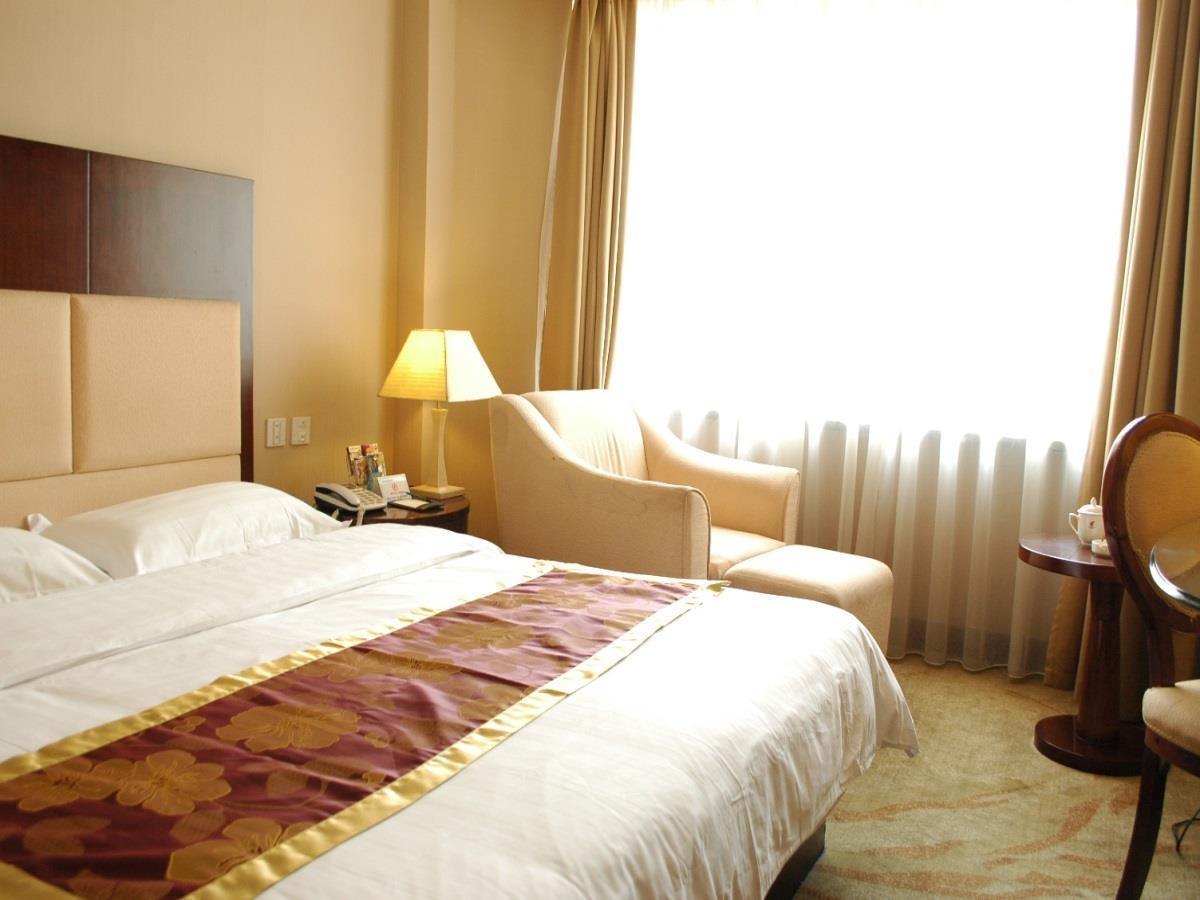 Tangyin Hotel Dalian Bagian luar foto
